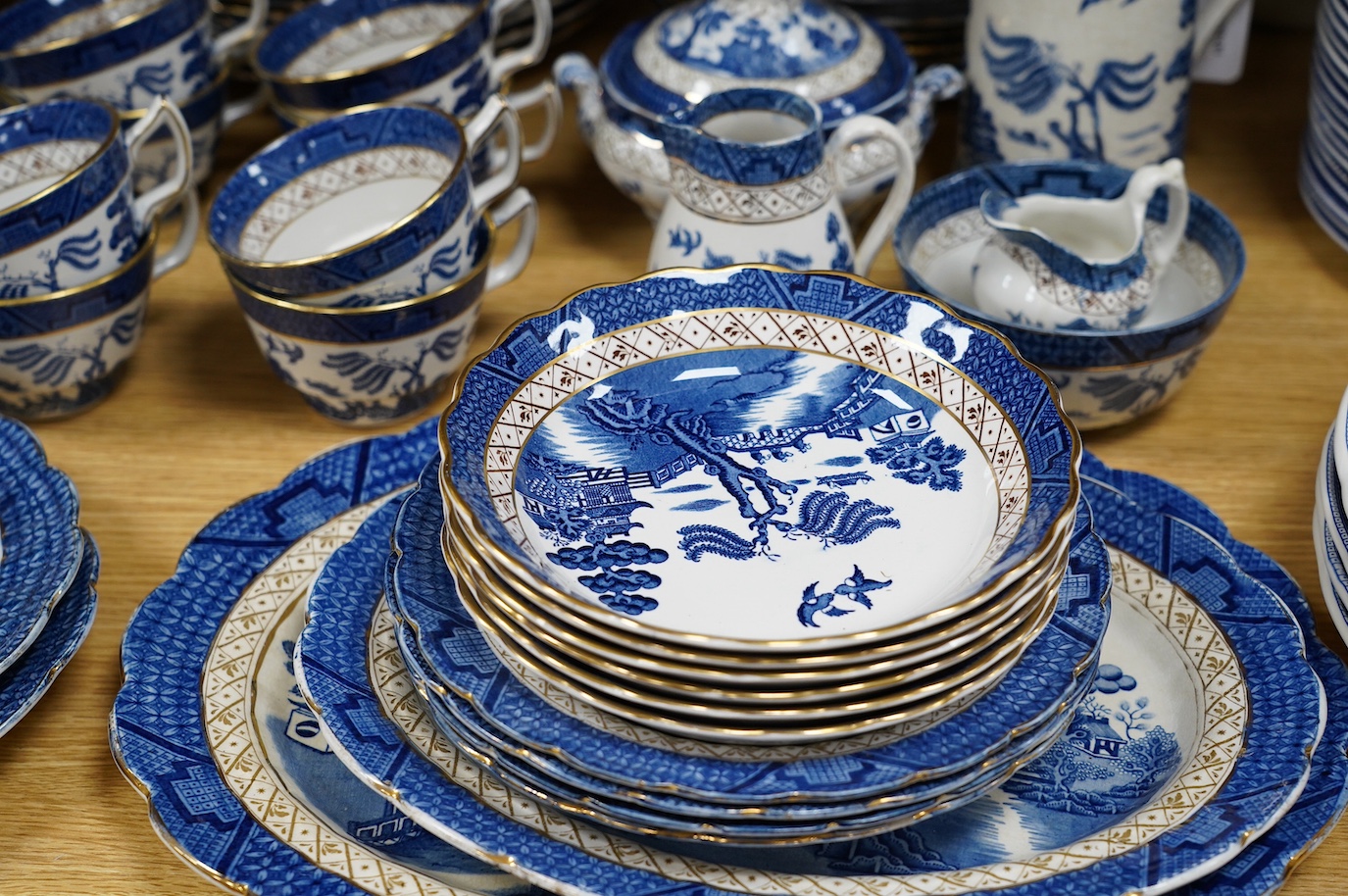 A large collection of Booths Real Old Willow, Woods Ware Willow and Old Chelsea blue and white dinner wares - condition - fair to good